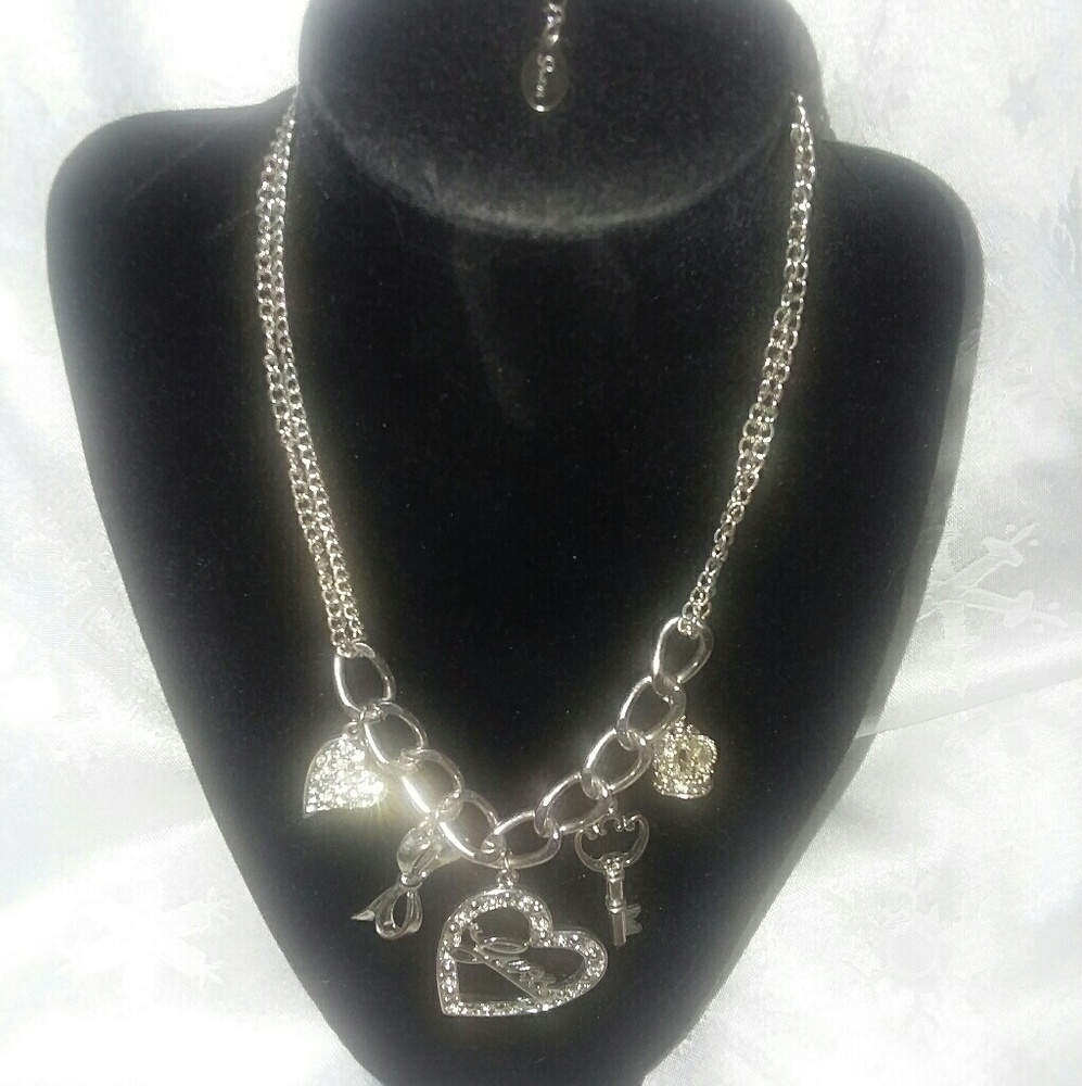 Guess charm necklace